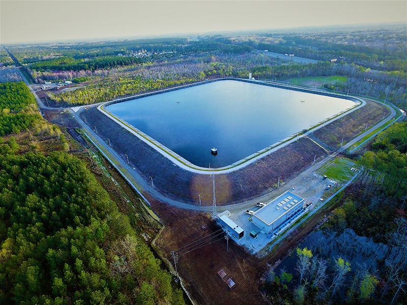 Aerial view of fully lined and filled fresh water reservoir